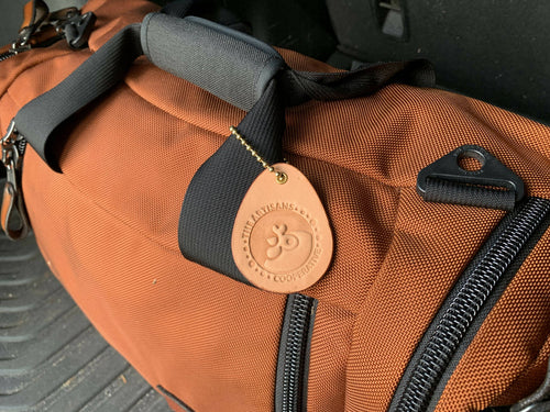 "Artisans Cooperative" Fundraiser Leather Keychain